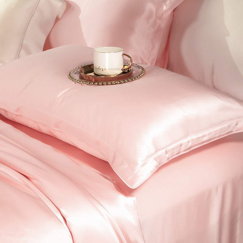 Juego de cama de seda de lujo rosa