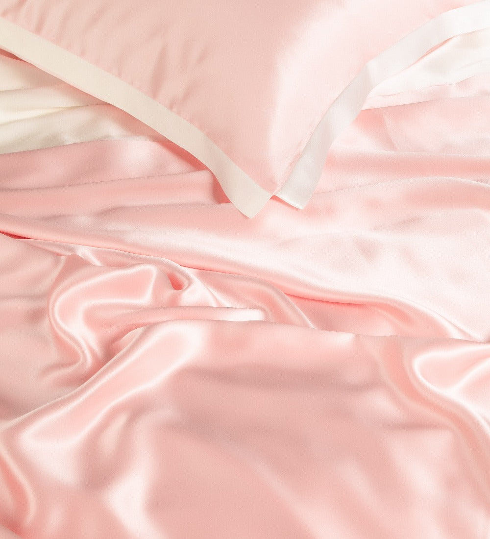 Juego de cama de seda de lujo rosa